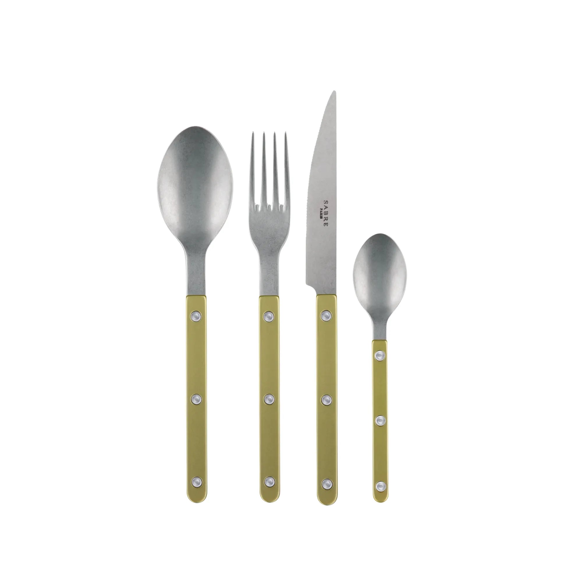 Beautiful Bistrot Pearly Cutlery Set with elegant pearl-colored handles and stainless steel accents on a white table