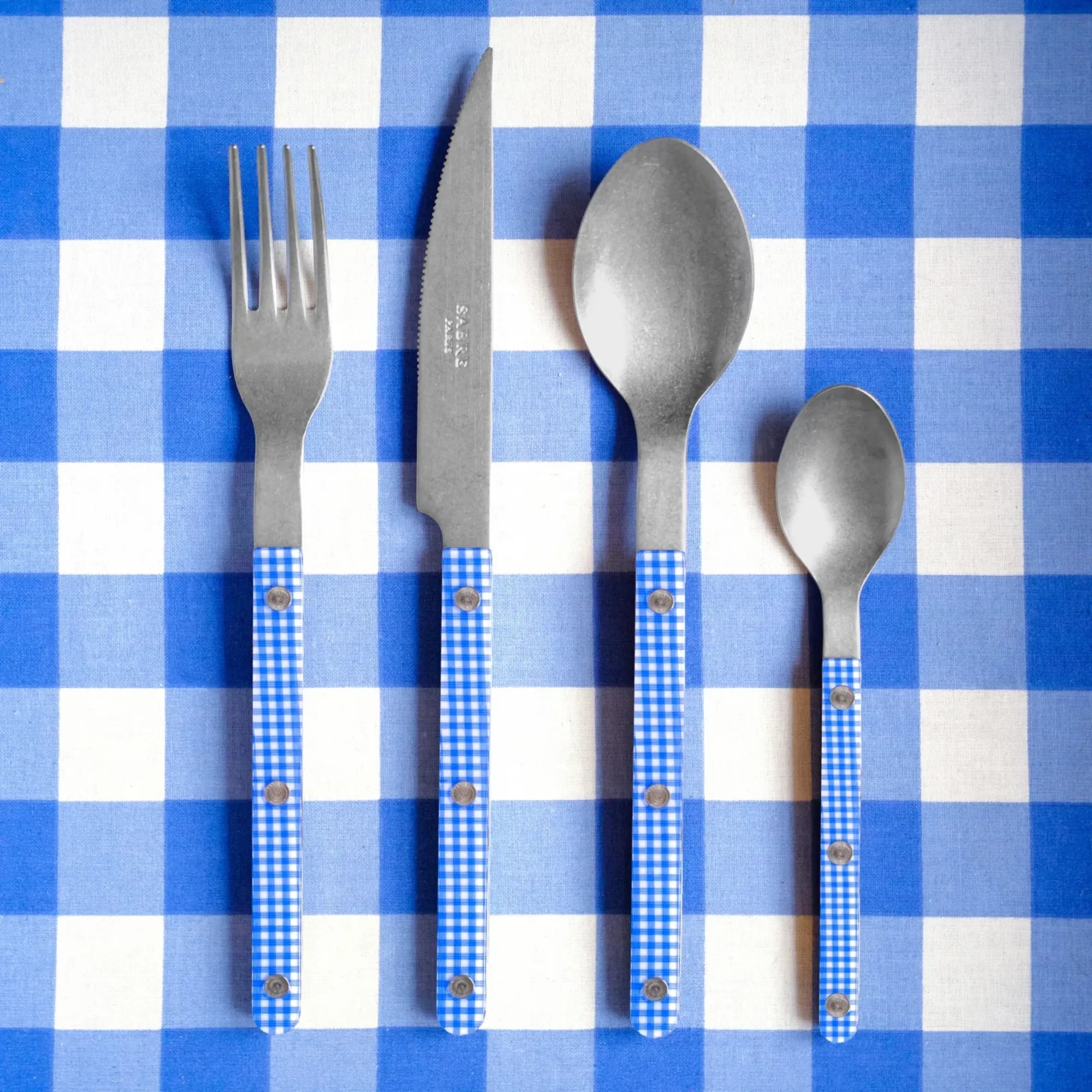 Bistrot Gingham Cutlery Set with classic checkered design in black and white, perfect for stylish table settings and elegant dining experiences