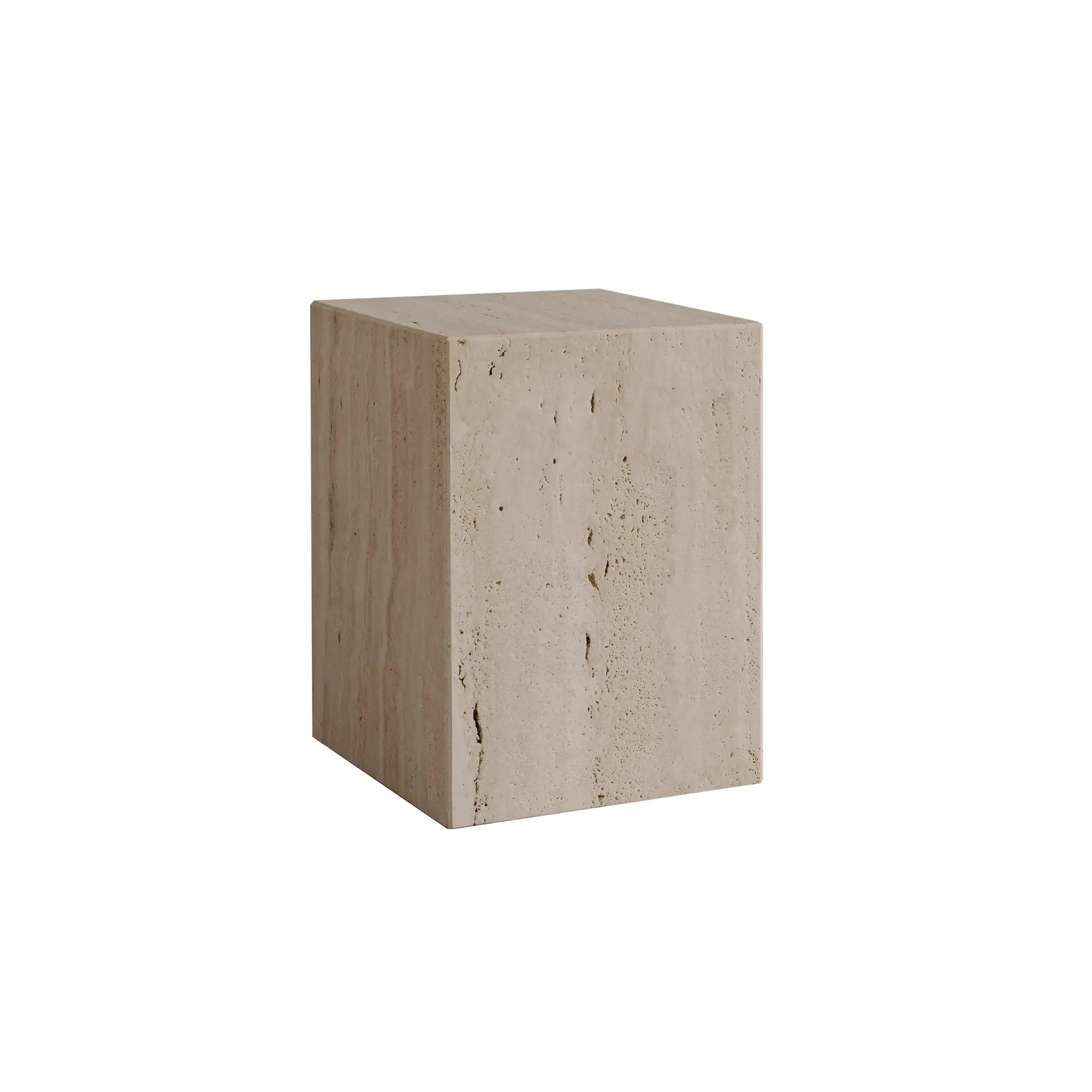 Coi Travertine Pillar standing tall with natural beige and ivory tones