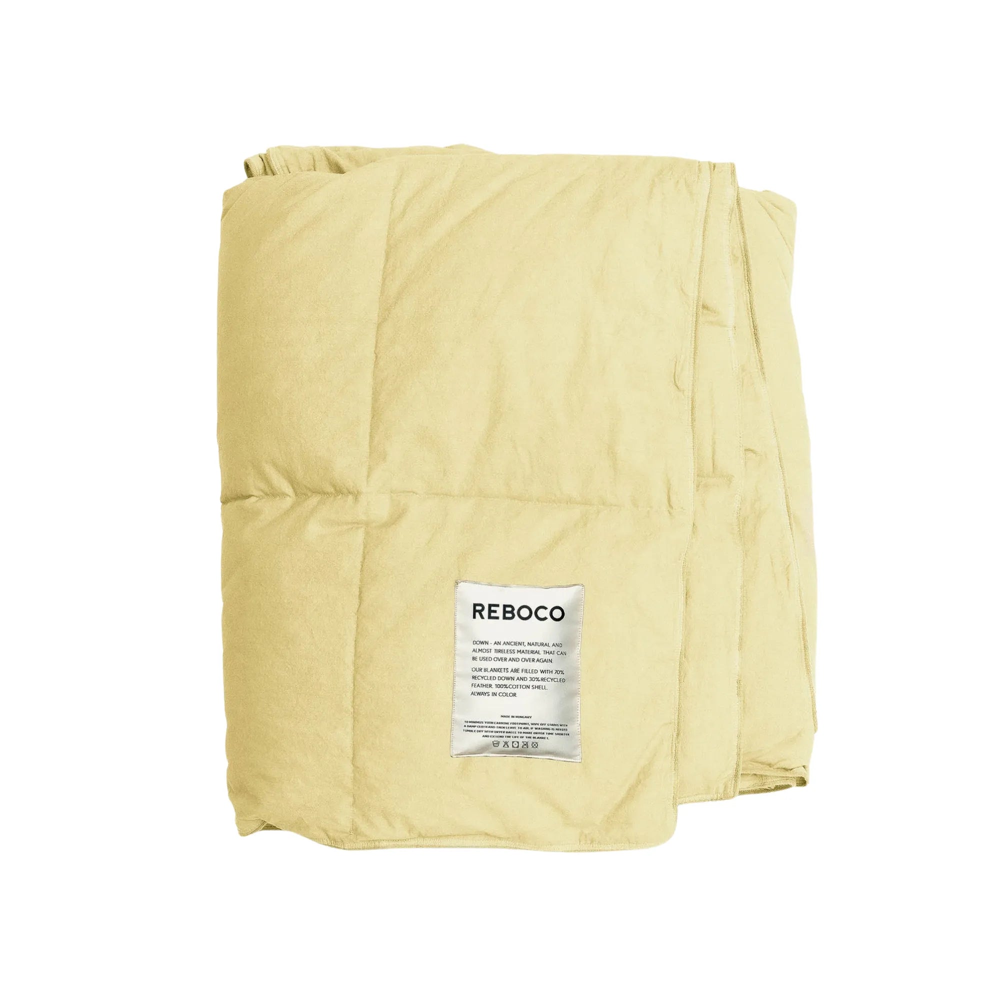 Down Blanket - Pale Banana provides luxurious warmth and comfort for a cozy night's sleep