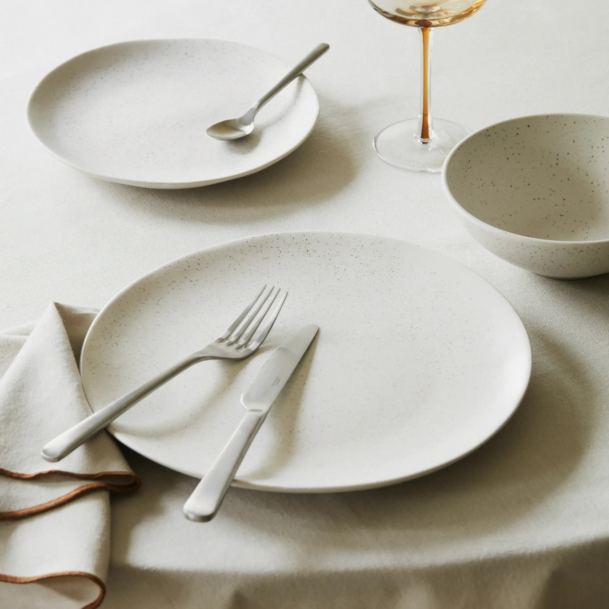 Complete your dining experience with the Nordic Vanilla Dinner Set for 4