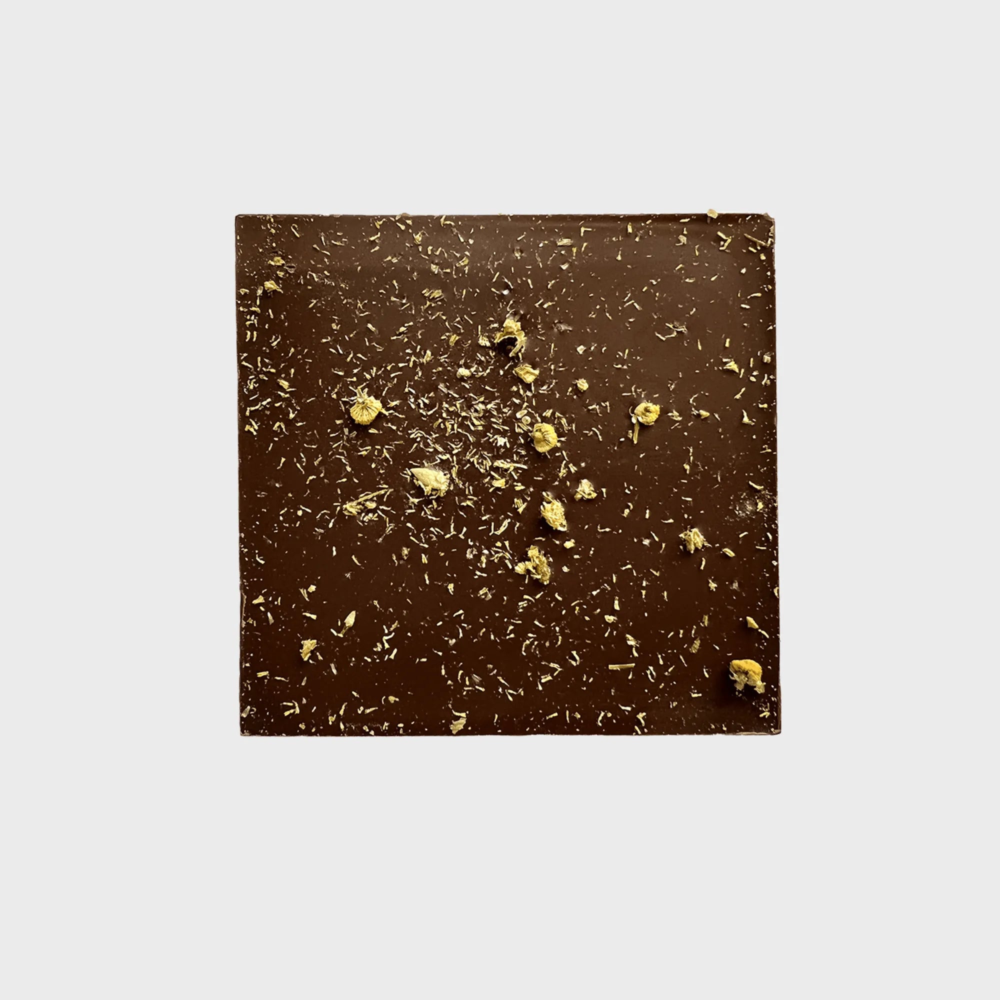 Artisanal chocolate bar infused with chamomile and sprinkled with candied chamomile petals