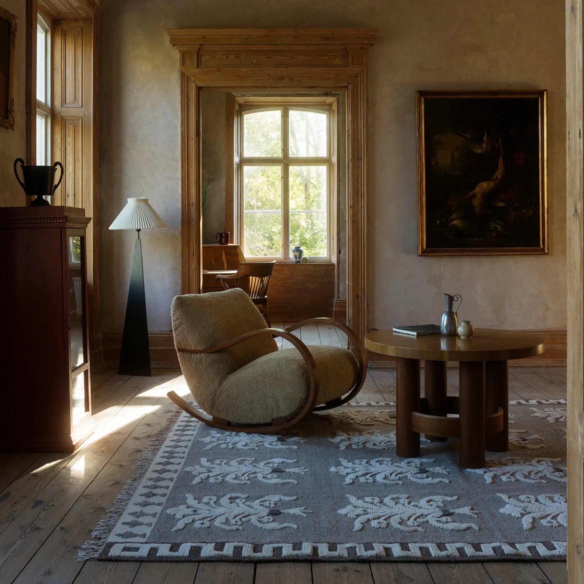 Hand-woven Rug No25 featuring a geometric pattern in earthy tones