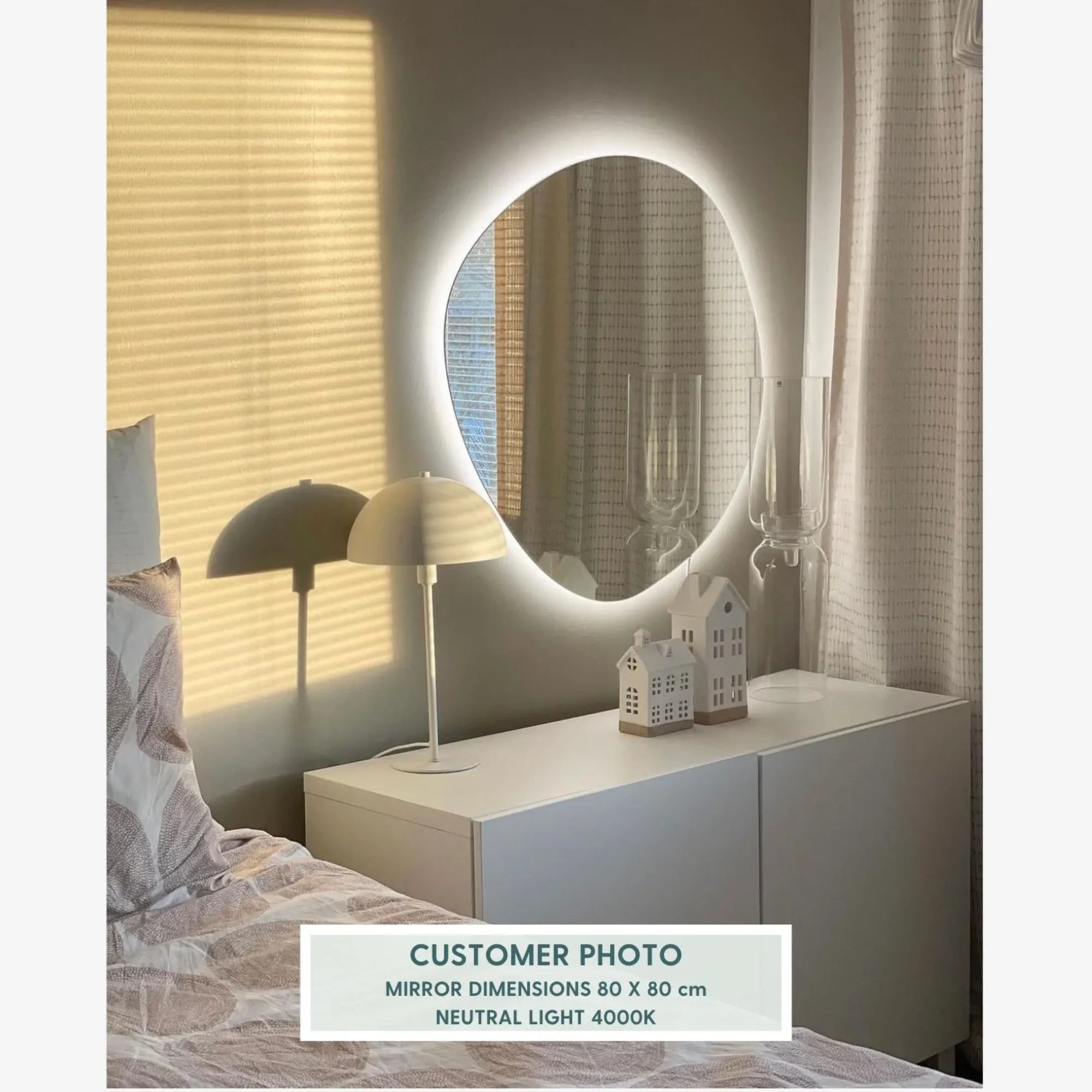 Pebble Mirror with Lights as a stylish statement piece in minimalist living room