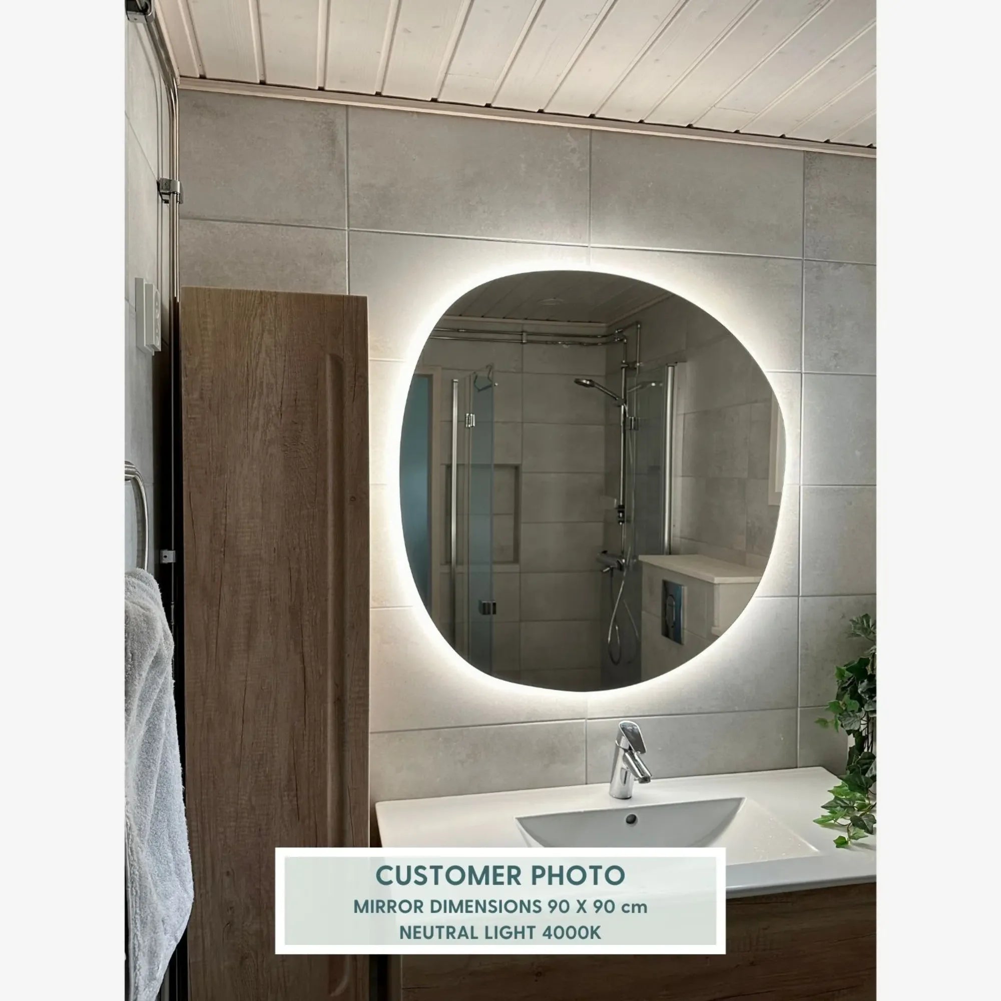 Pebble mirror with lights reflecting elegant and modern interior design