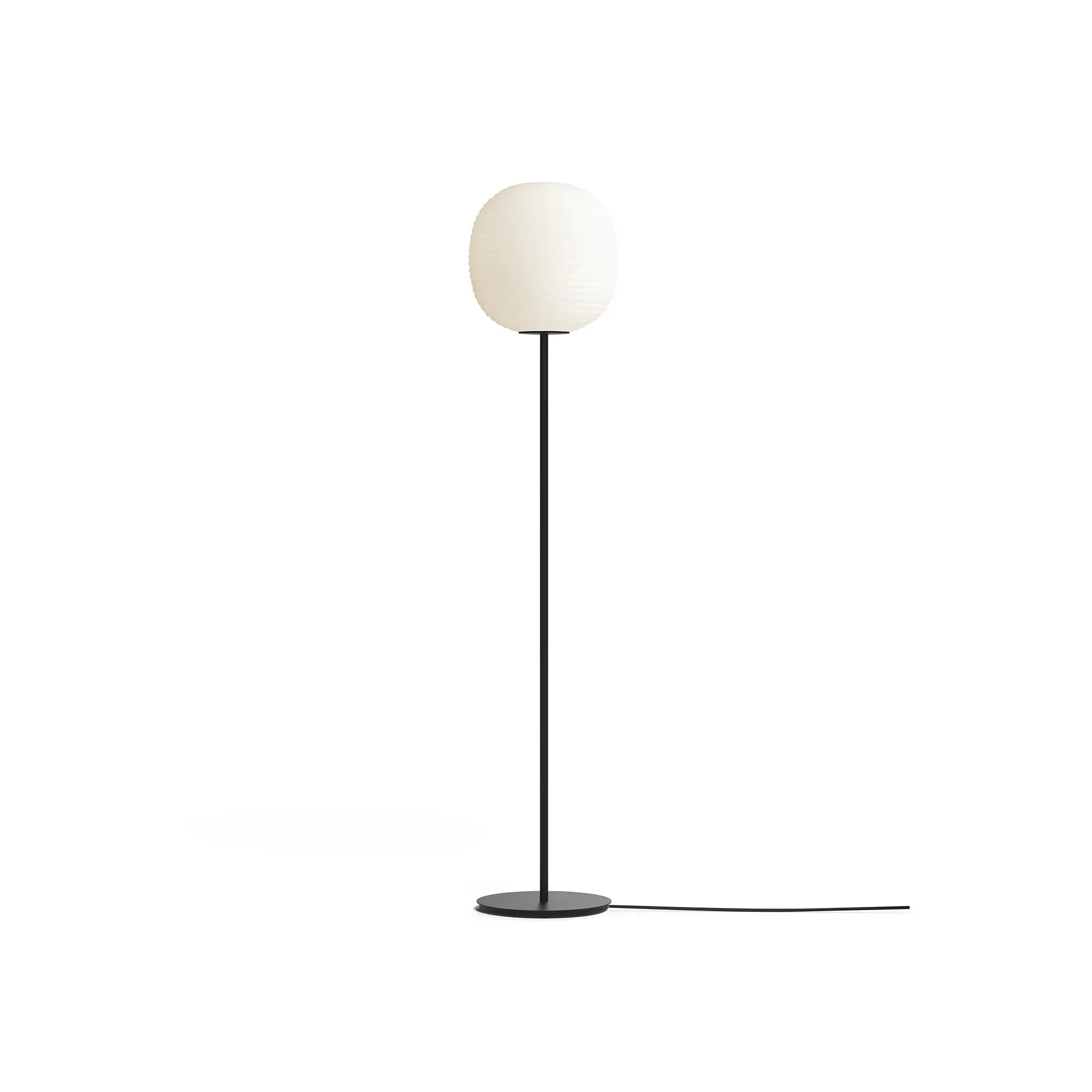 Lantern floor lamp with black metal frame and white fabric shade