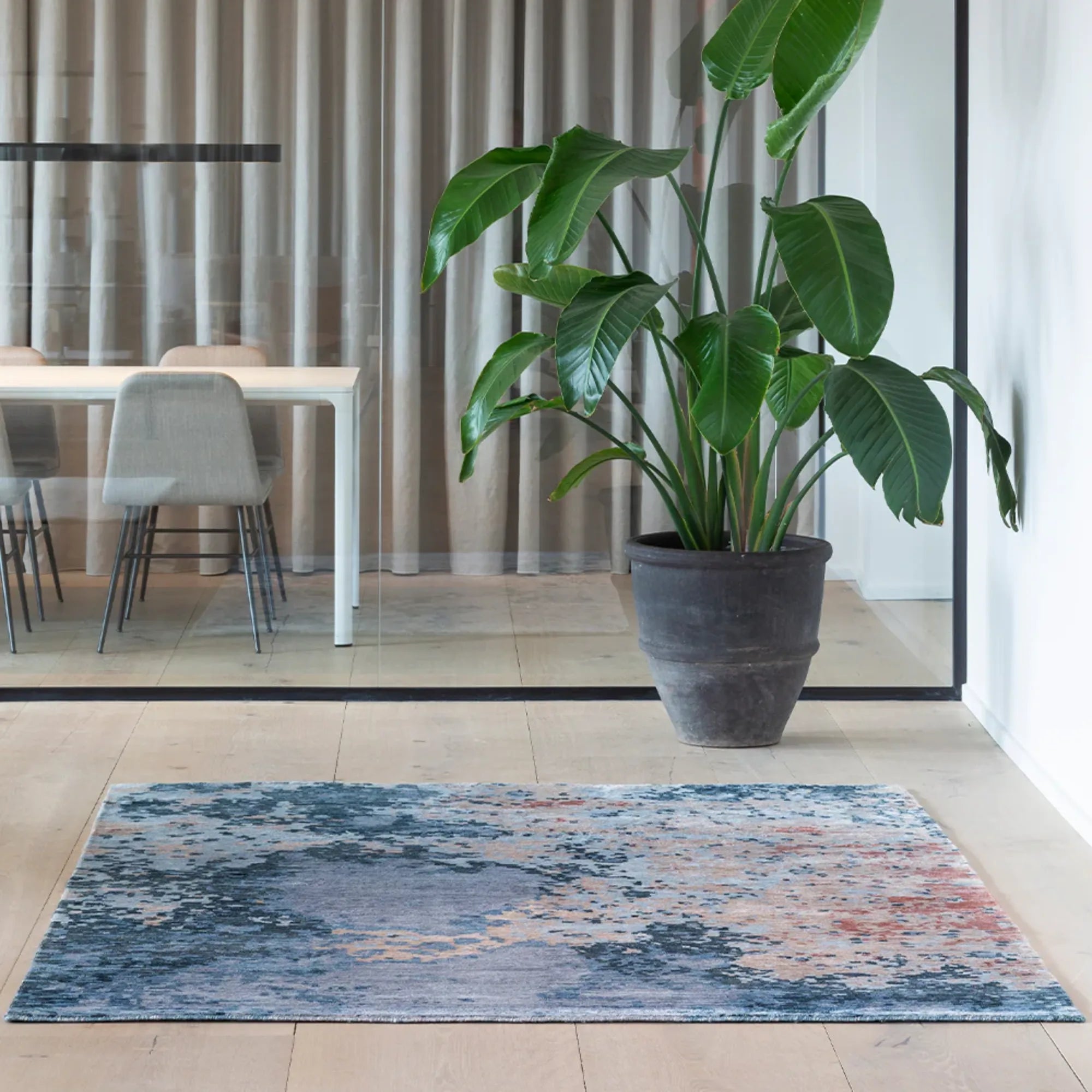 Large rectangular ocean-themed rug with shades of blue and green