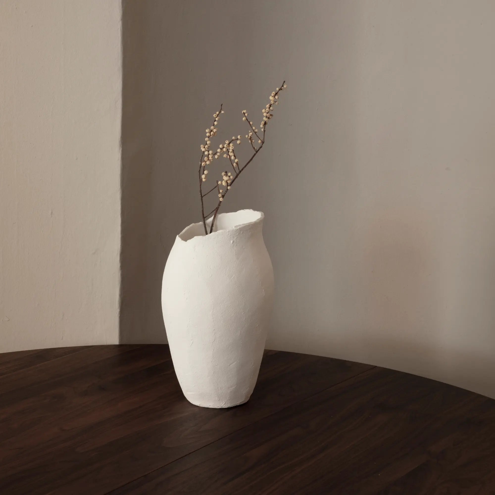  Side view of Magnolia Vase with a glossy finish and scalloped edges