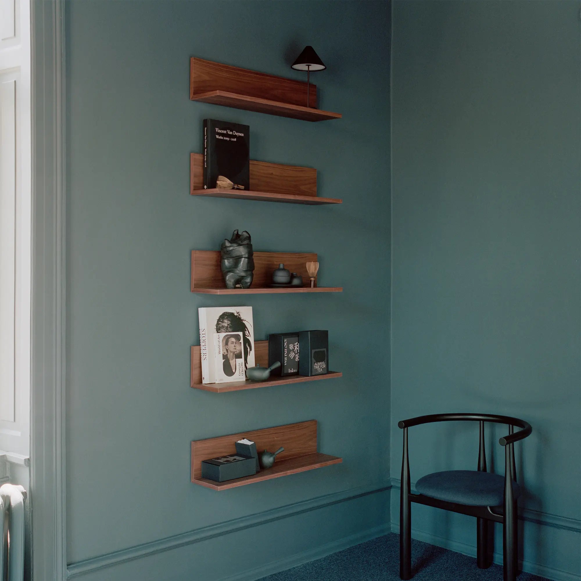 Tana Wall Shelf in oak finish, perfect for displaying books and decor