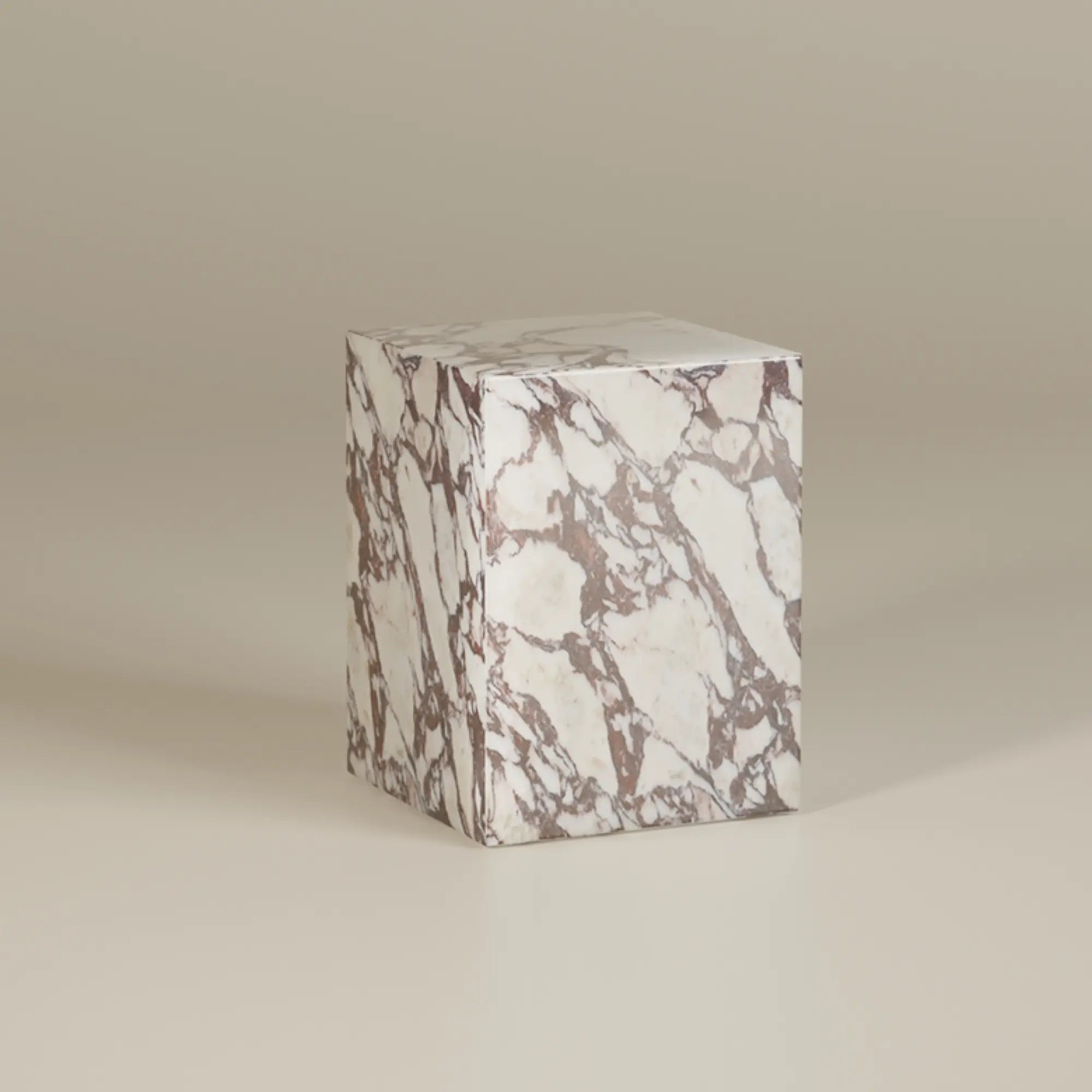 Coi Marble Pillar with intricate white veining and smooth finish