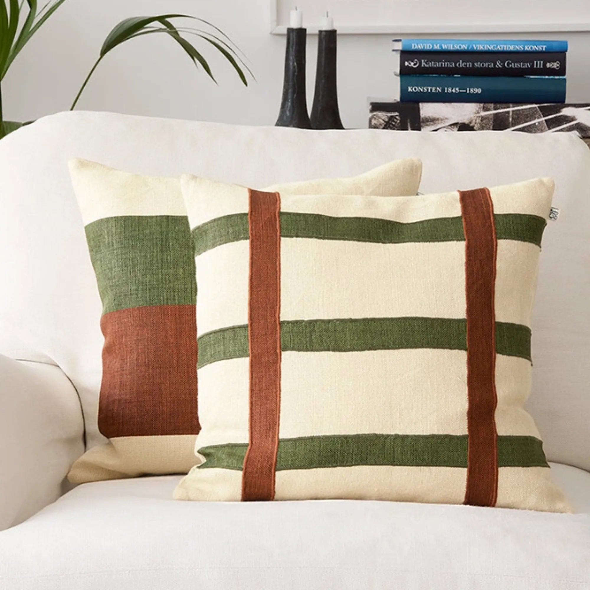 Square throw pillow with linen fabric in earthy tones