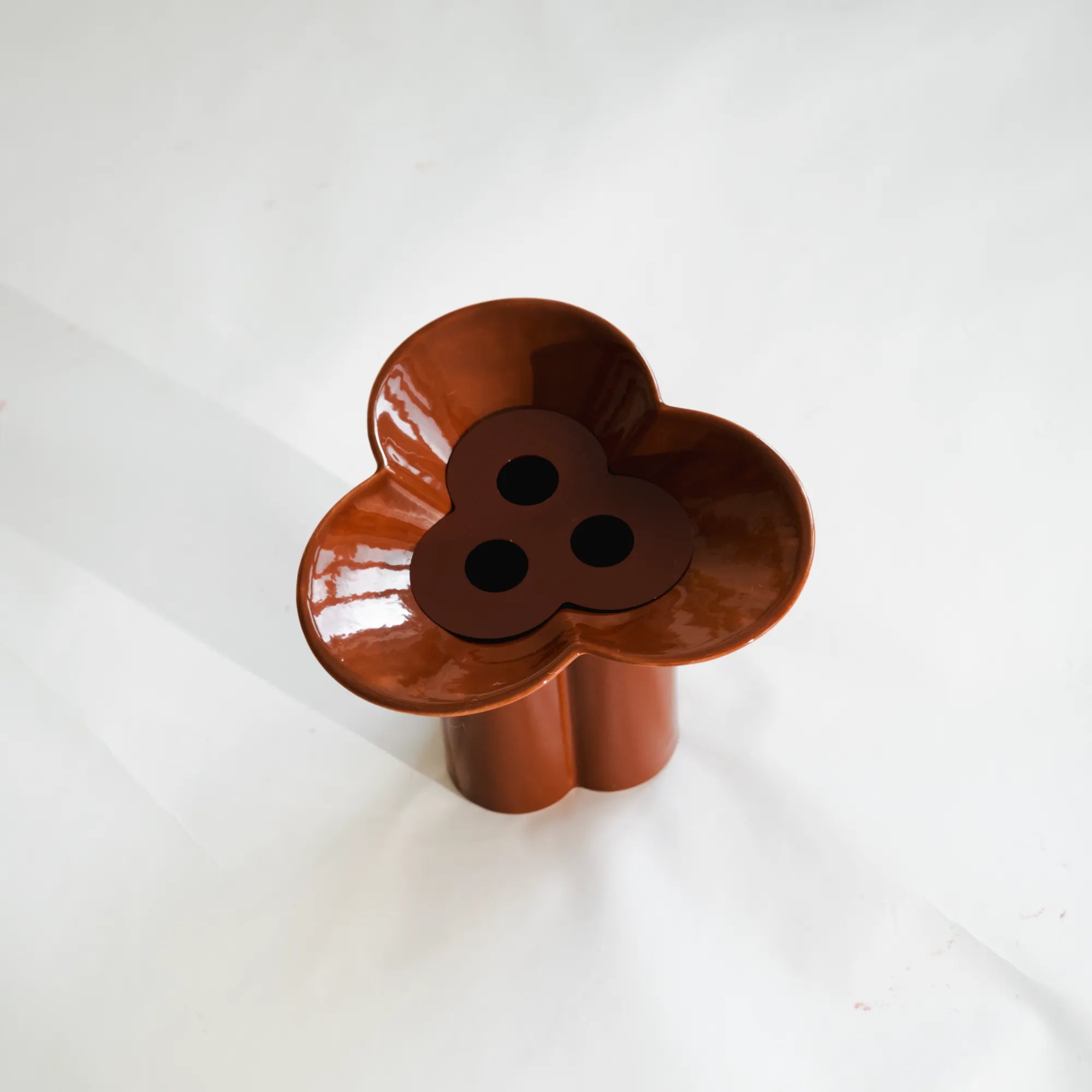 Beautiful handcrafted ceramic vase with a unique clover design and elegant finish